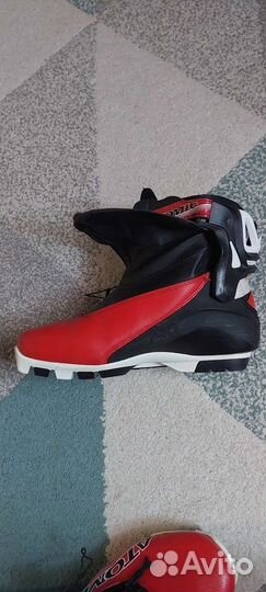 Лыжные ботинки коньковые atomic