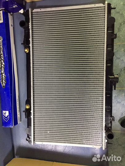 Новый Радиатор Nissan almera N16 pulsar YD22DD