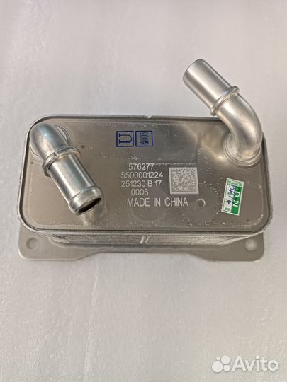 Радиатор масляный Geely Atlas