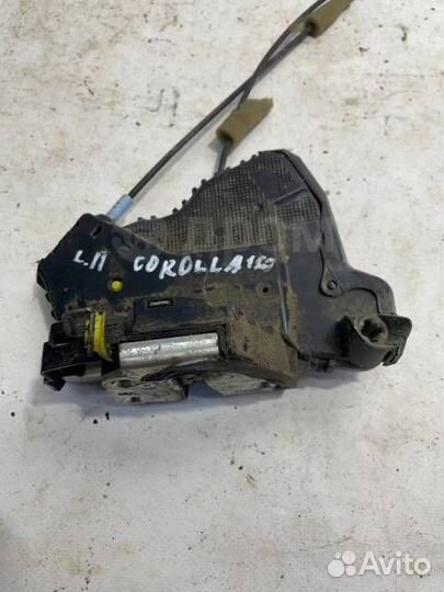 Замок двери передний левый Toyota Corolla E150