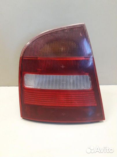 Фонарь левый Skoda Octavia