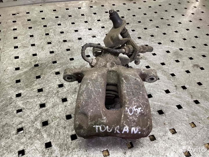 Суппорт задний левый Volkswagen Touran