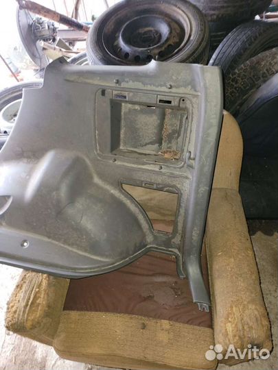 Пластик на крышке багажника чери тиго