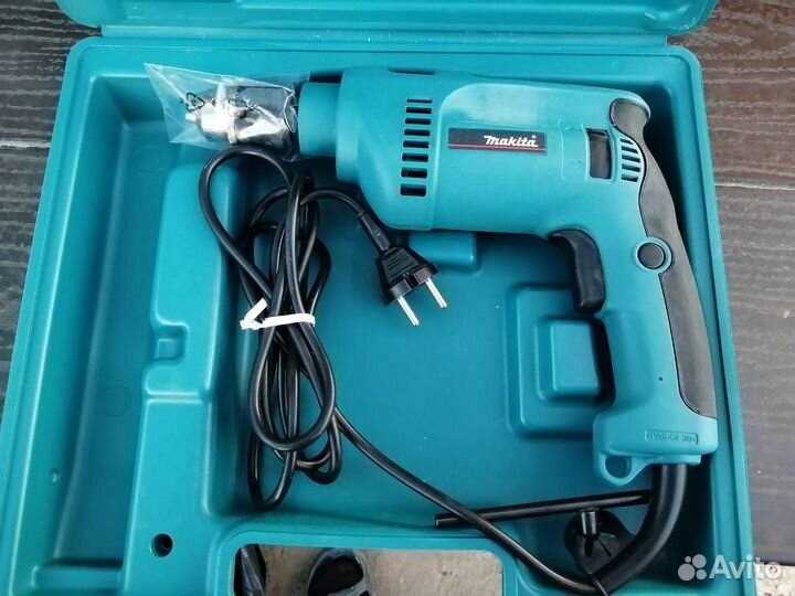 Ударная дрель makita HP1620K