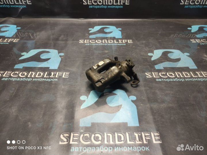 Суппорт тормозной задний левый Peugeot 308