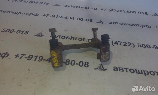 Скоба суппорта заднего Nissan Maxima CA33