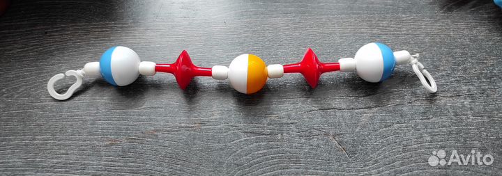 Растяжки, погремушки на коляску