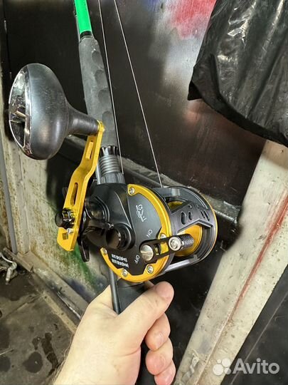 Рыболовные катушка и спиннинг для троллинга