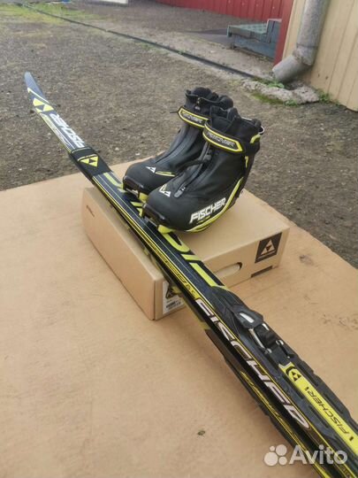 Лыжи беговые fisher торг