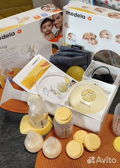 Молокоотсос Medela swing электрический + бутылочки