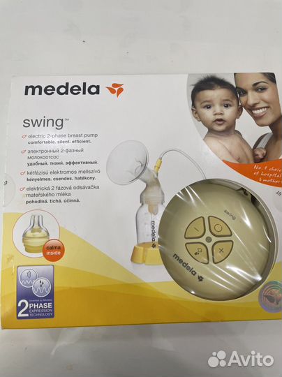 Молокоотсос medela swing электрический