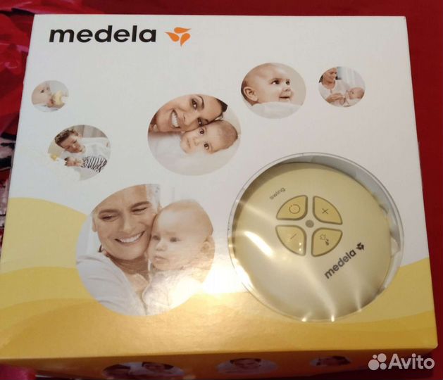 Молокоотсос medela электрический