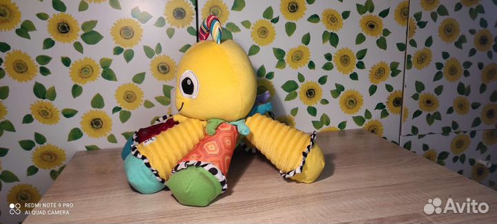 Детская игрушка музыкальная. Осьминог