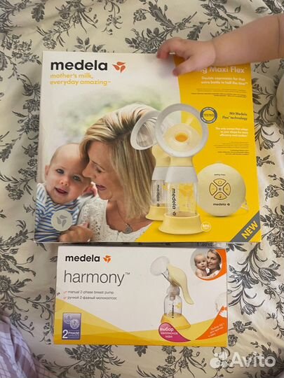 Молокоотсос medela электрический