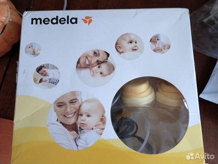 Молокоотсос электрический Medela swing maxi