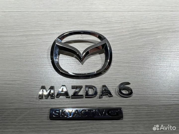 Эмблема Mazda 6