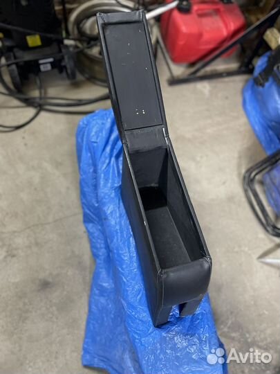 Подлокотник