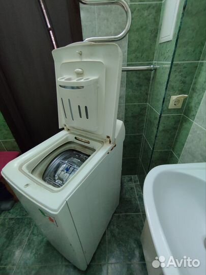 Стиральная машина с вертикальной загрузкой