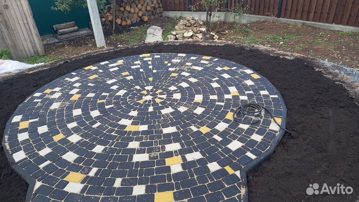 Укладка тротуарной плитки брусчатки