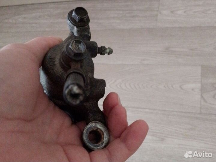 Суппорт задний левый