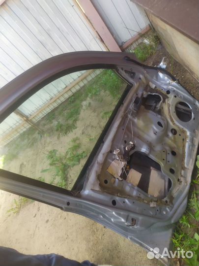 Двери nissan almera