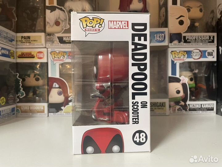 Funko pop Deadpool on scooter