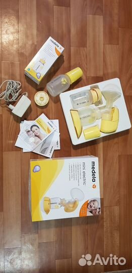 Молокоотсос medela электрический