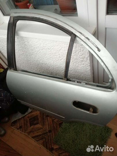 Задняя левая дверь Nissan Almera Classic