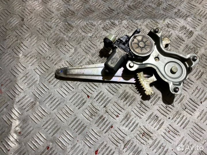 Стеклоподъемник задний правый Mitsubishi L 200