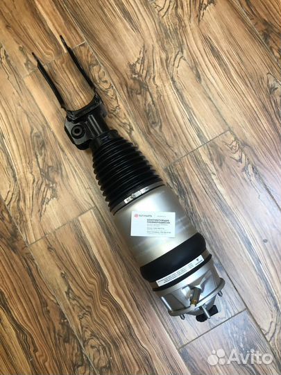 Левый пневмоамортизатор Volkswagen NF 7P6616039M