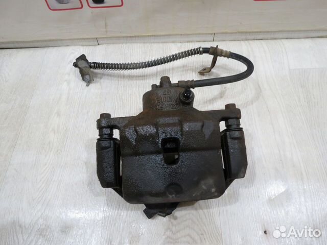 Суппорт тормозной передний левый Hyundai i30 2