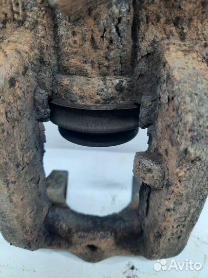 Суппорт тормозной задний правый Chevrolet Orlando