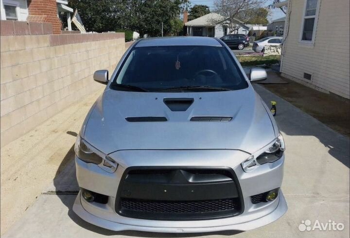 Накладки на передние фары для Mitsubishi Lancer X