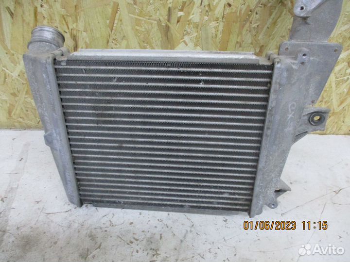Радиатор интеркулера Мазда сх-7 2,3 АКПП