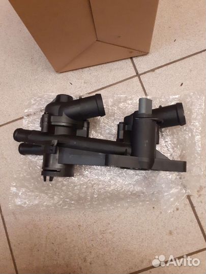 Термостат с корпусом VW Jetta,Polo, Rapid,Fabia