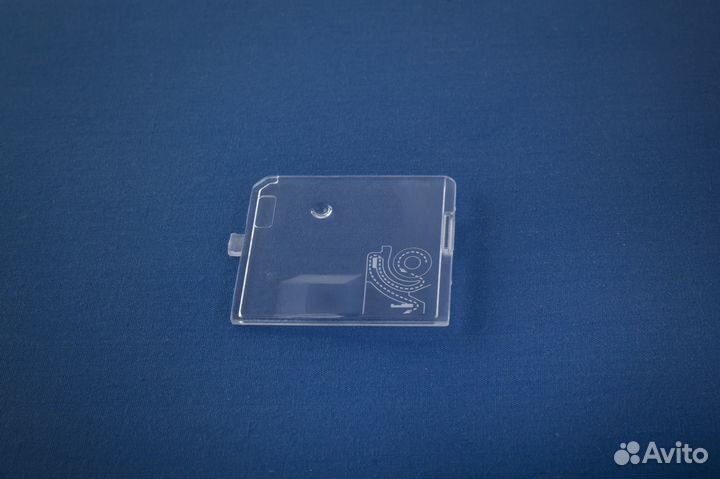 Стеклышко (крышка челнока) Necchi 7434AT; 7575; Q1