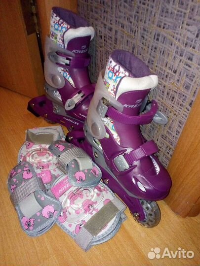 Роликовые коньки