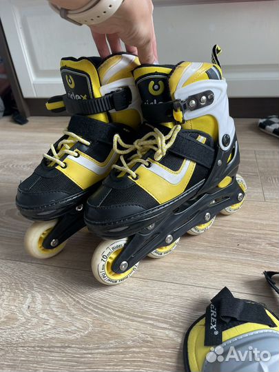 Роликовые коньки