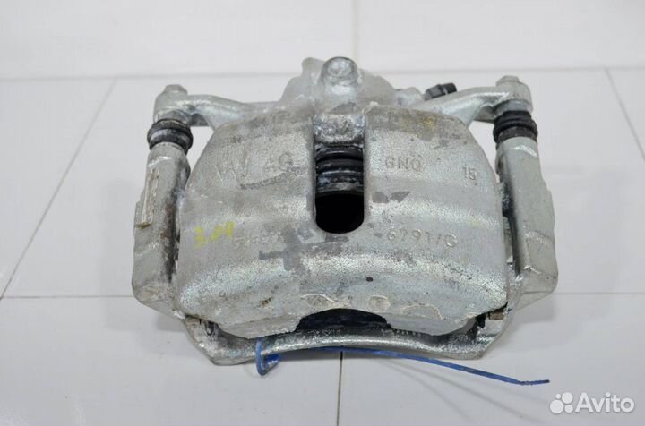 Суппорт тормозной передний левый Volkswagen Golf 7