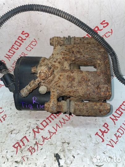 Суппорт тормозной задний правый Volkswagen Tiguan