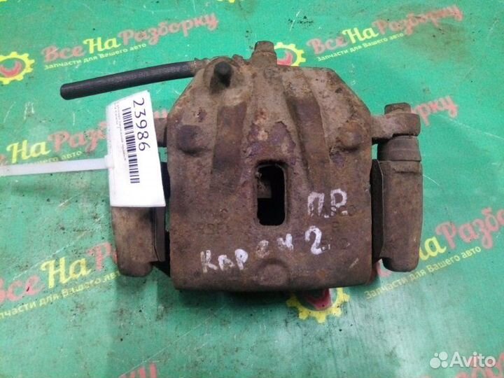 Суппорт передний правый Kia Carens 2