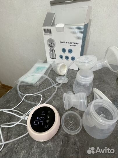 Классный Молокоотсос электрический