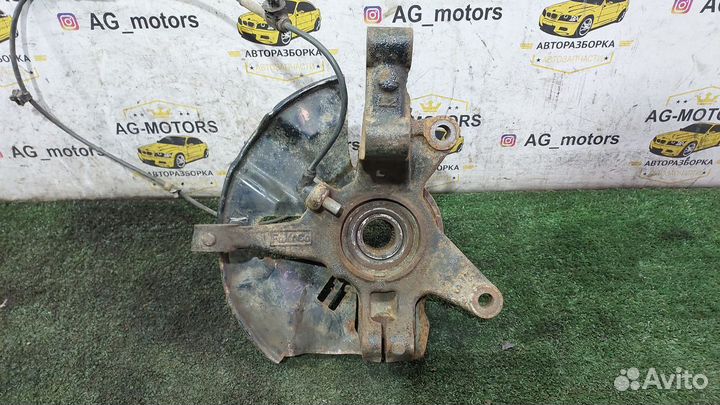 Кулак поворотный передний левый CX-7 2.3