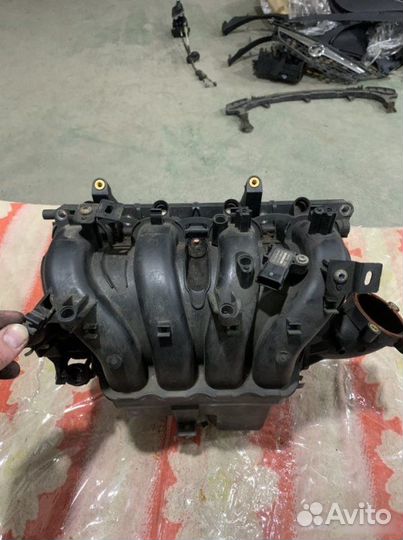 Коллектор впускной Opel Astra J A16XER 2009-2012