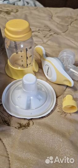 Ручной сцеживатель молокоотсос medela с пакетами