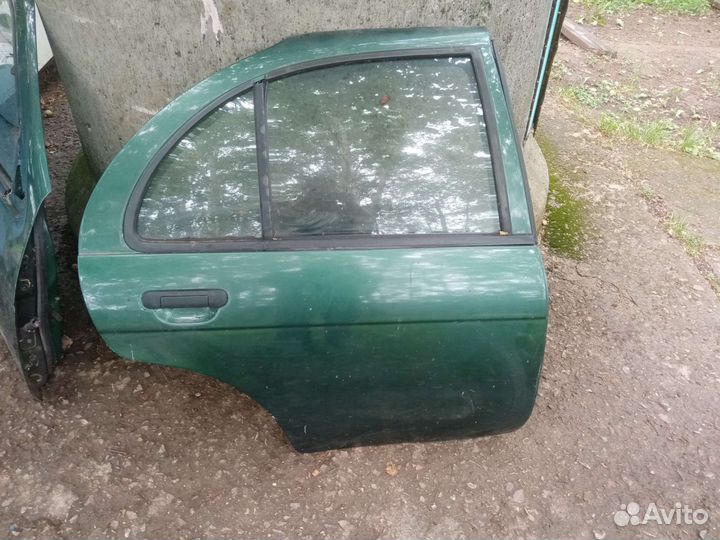 Дверь nissan almera n15