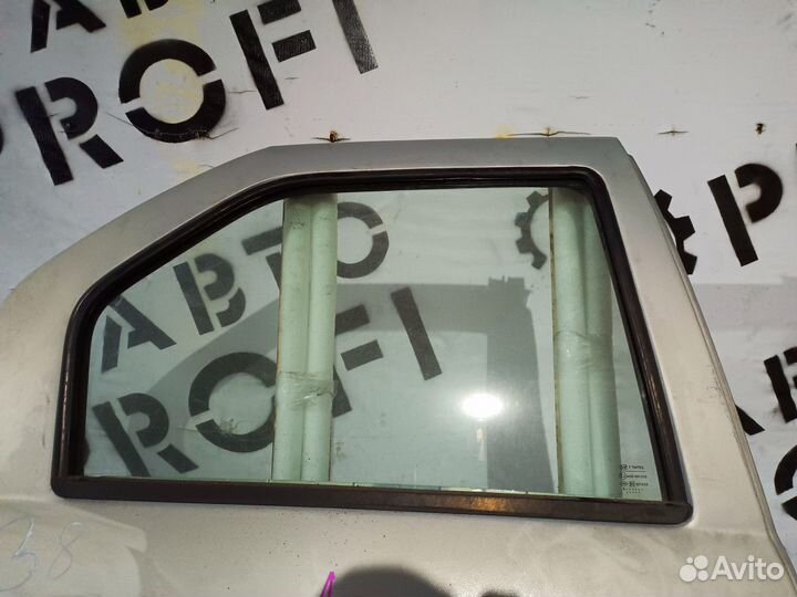 Стекло двери задней правой Renault Logan