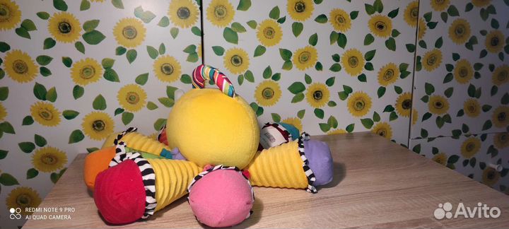 Детская игрушка музыкальная. Осьминог