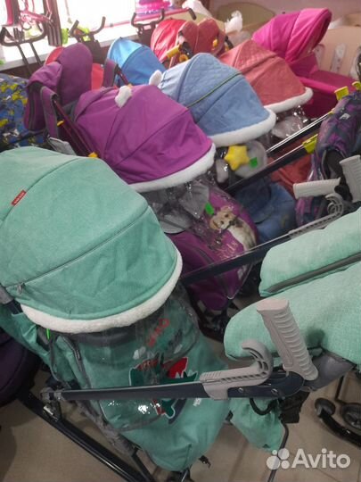 Санки коляска ника в наличии меховые с варежками