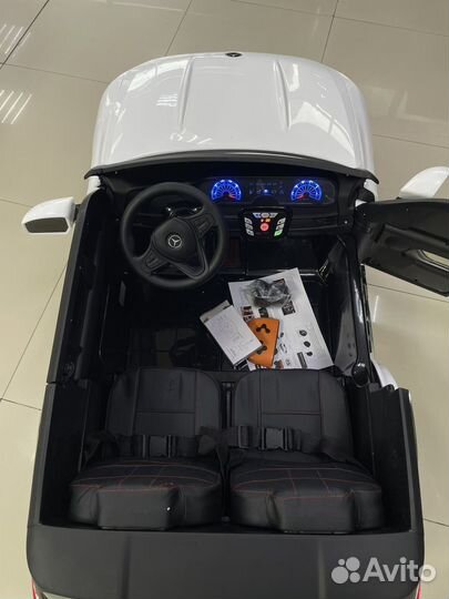 Детский электромобиль двухместный